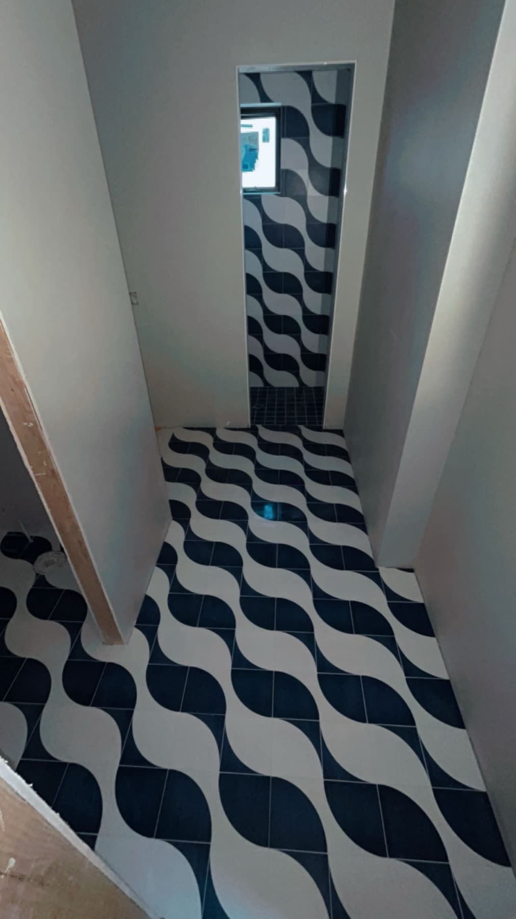 Black and white patterned tile floor