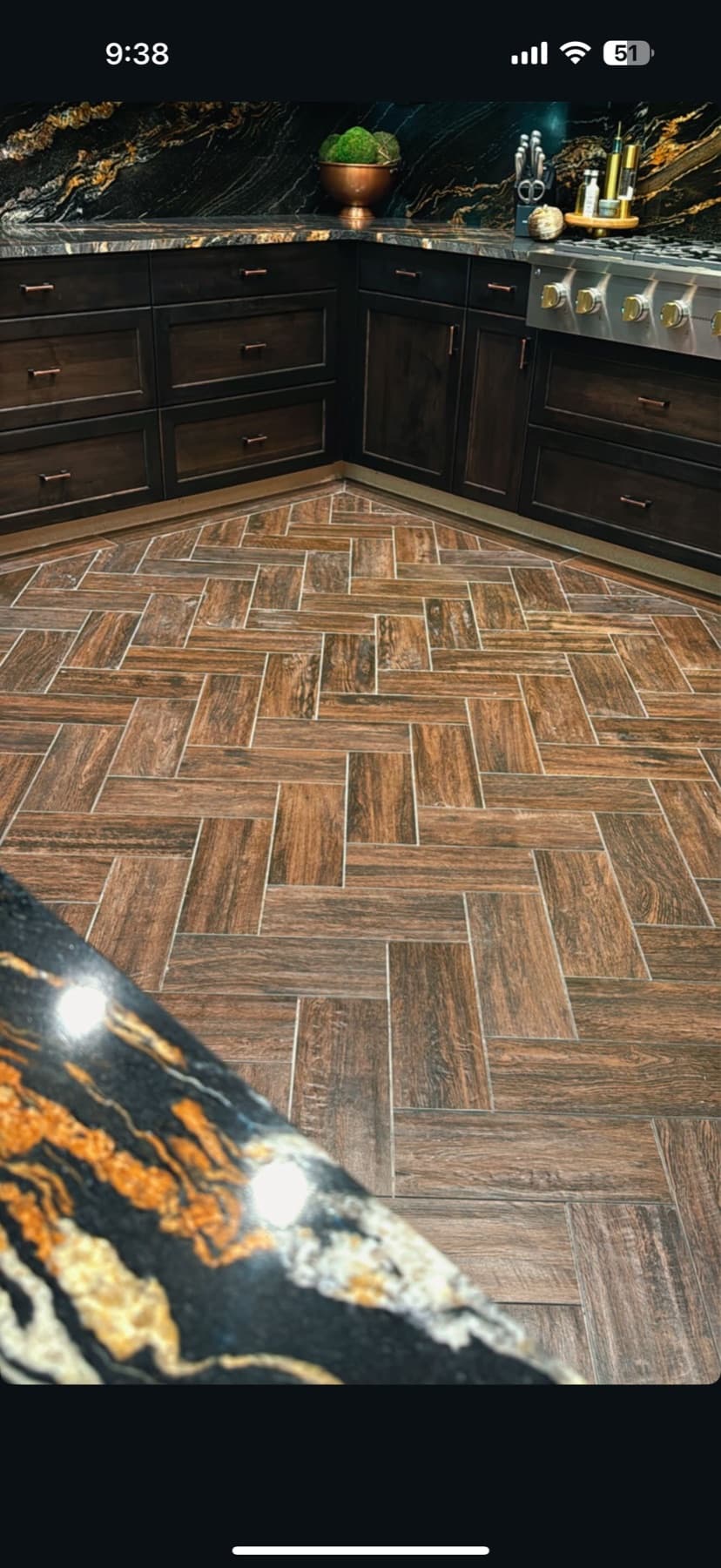 Herringbone wood-look tile floor