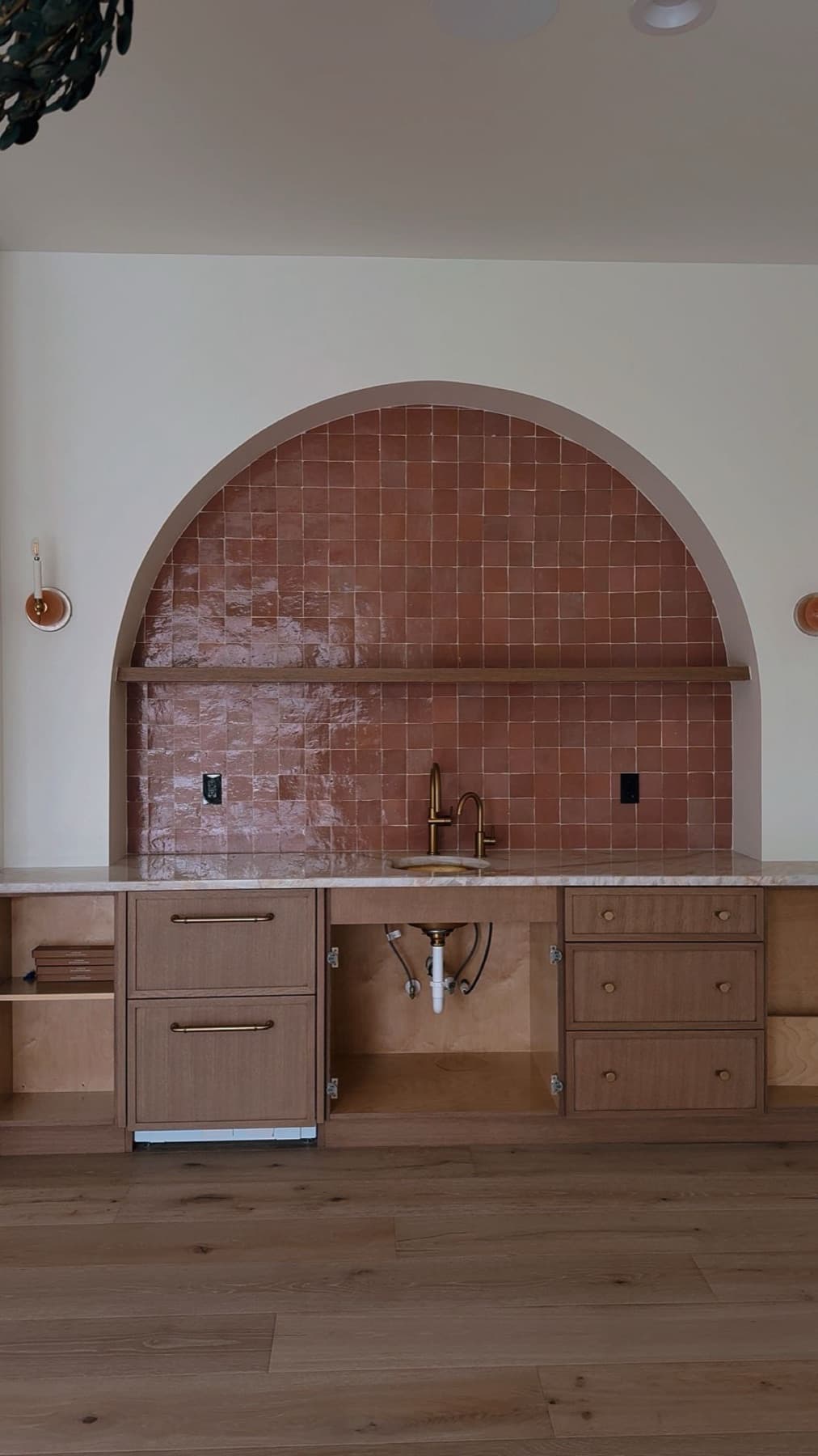 Arched stone niche feature wall